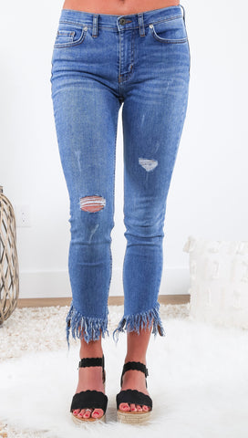 Frayed skinny jeans hot sale